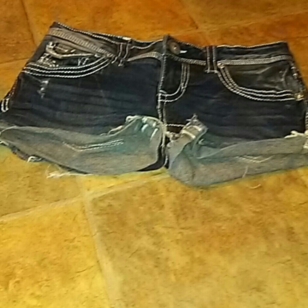 Amethyst little distressed jean shorts.
